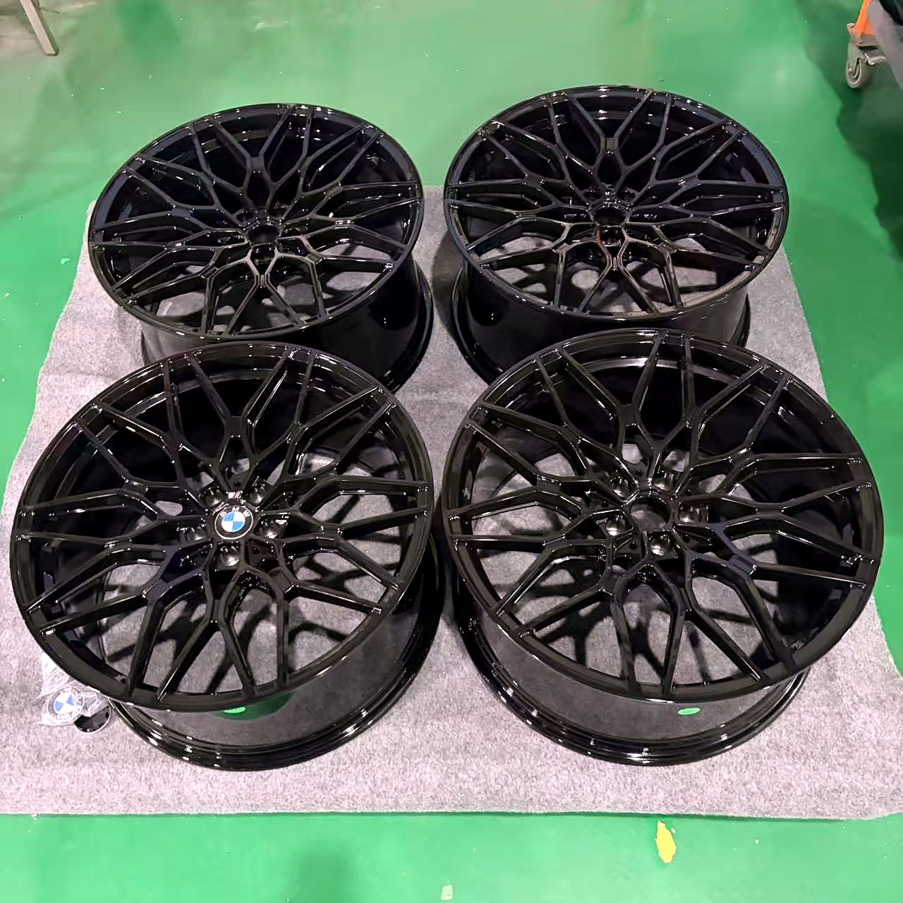 The four finished wheels in gloss black